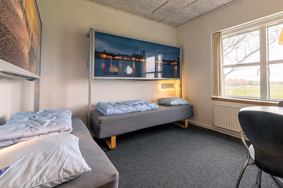 Double-room-at-Danhostel-Ribe-with-a-view-to-National-park-Wadden Sea